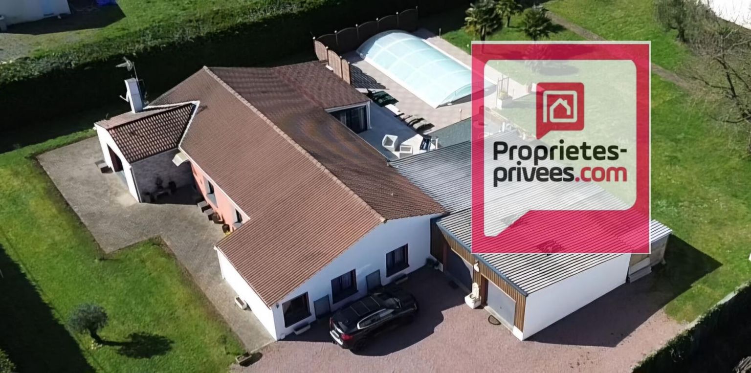 PETOSSE VASTE VILLA PLAIN PIED 180 m2 AVEC PISCINE COUVERTE ET PARC ARBORE 2