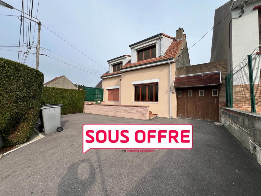 Maison à rénover à Maisnil-lès-Ruitz - Grand potentiel avec jardin, dépendances et garage