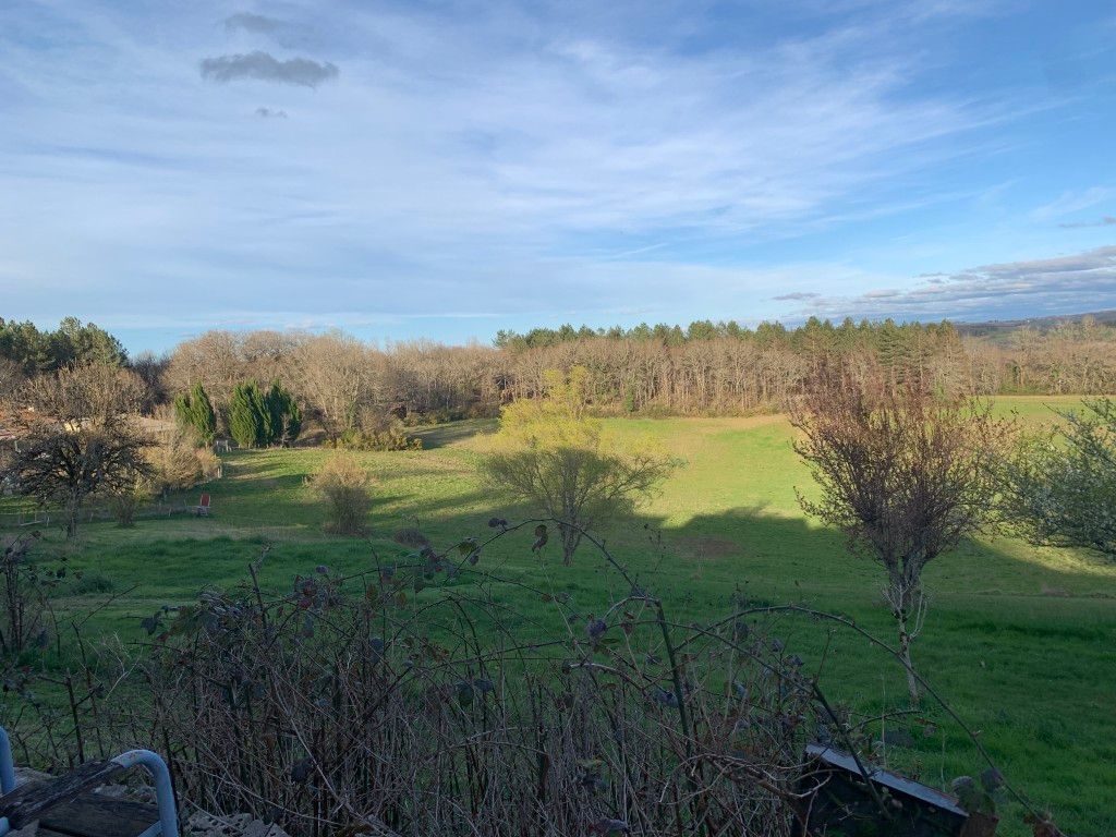 CATUS Maison 70 m2 aménagée dans un ancien corps de ferme, dépendances, terrain arboré avec vue 4
