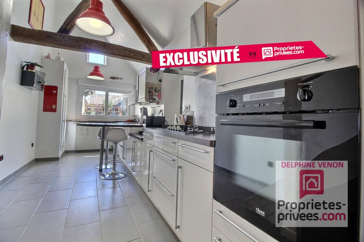 EXCLUSIVITE - Maison de ville avec garage et jardin à 2 pas de la Loire et des commerces à Saint Denis De L Hotel
