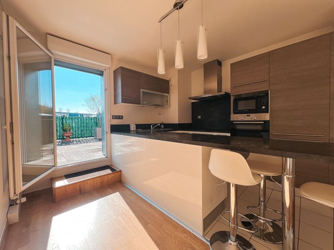 ORVAULT APPARTEMENT ORVAULT BOURG - 3 CHAMBRES AVEC TERRASSE ET 2 STATIONNEMENTS 4