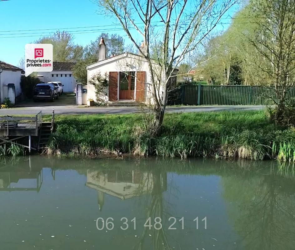 Ravissante maison plain-pied 4 pièce(s) 126 m2 au ord de l'eau , situé au coeur du parc naturel du Marais Poitevin