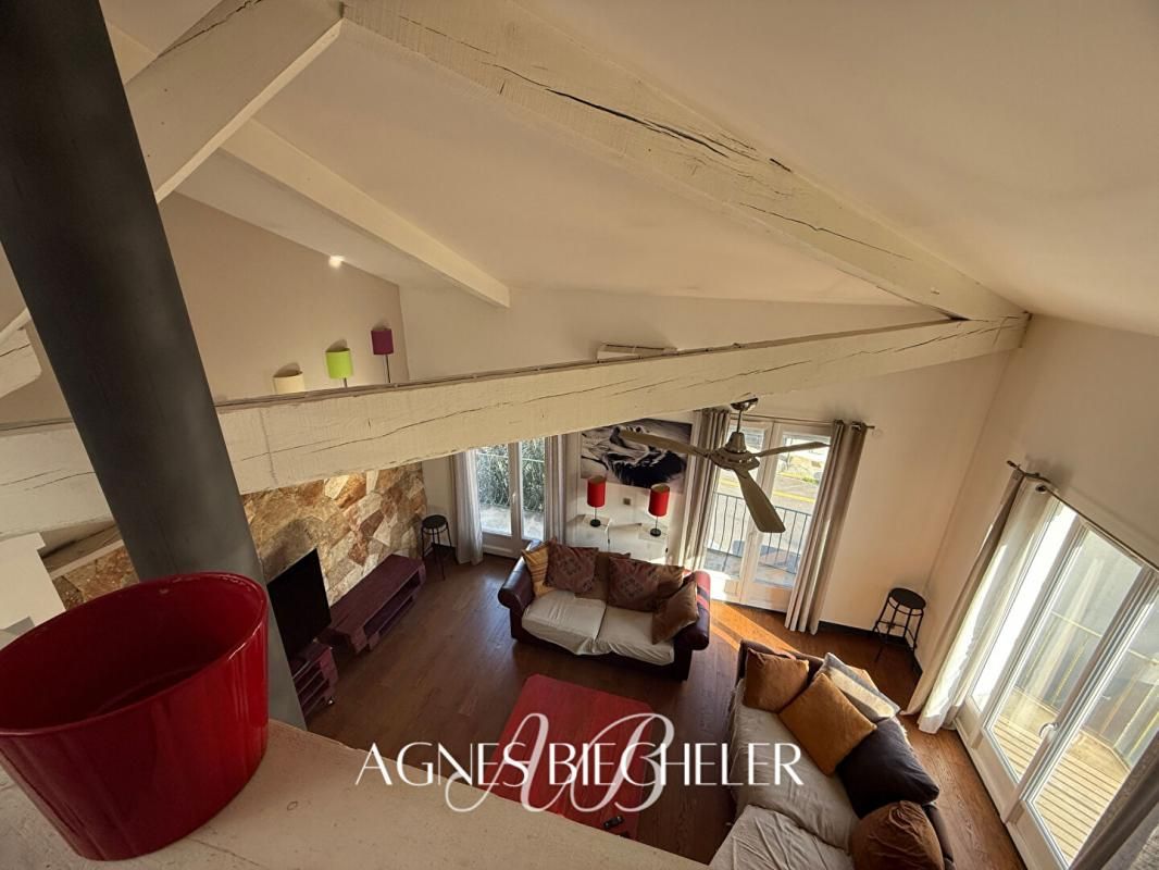 Loft 4 pièce(s) 125 m2 avec balcons et jardin