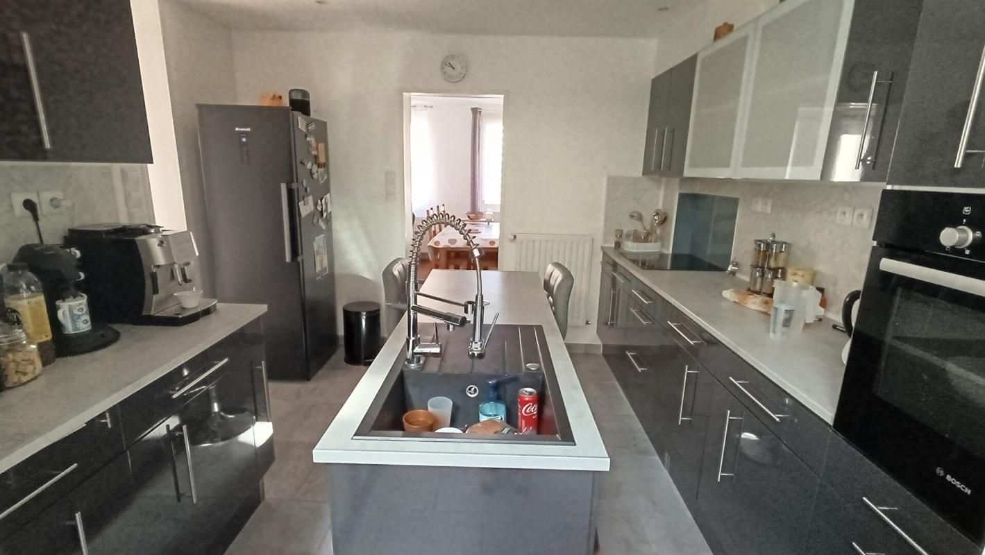 FERE-CHAMPENOISE Maison 5 pièce(s) 90 m2 4