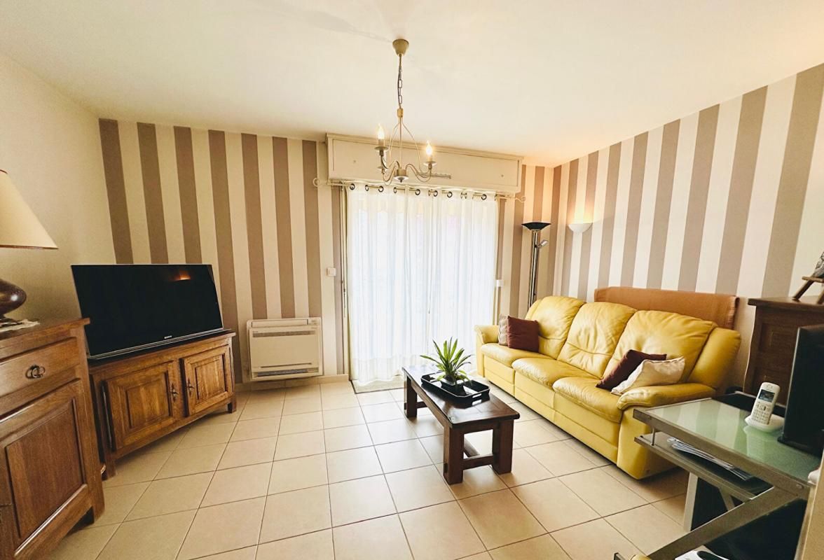 APPARTEMENT T4 en rez de chaussée + Parking + Caves privatives