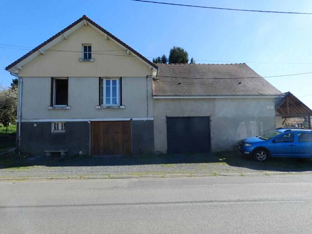 Maison 115 m2 habitables / 3 chambres / s/sol / grand garage / terrain 1548m²