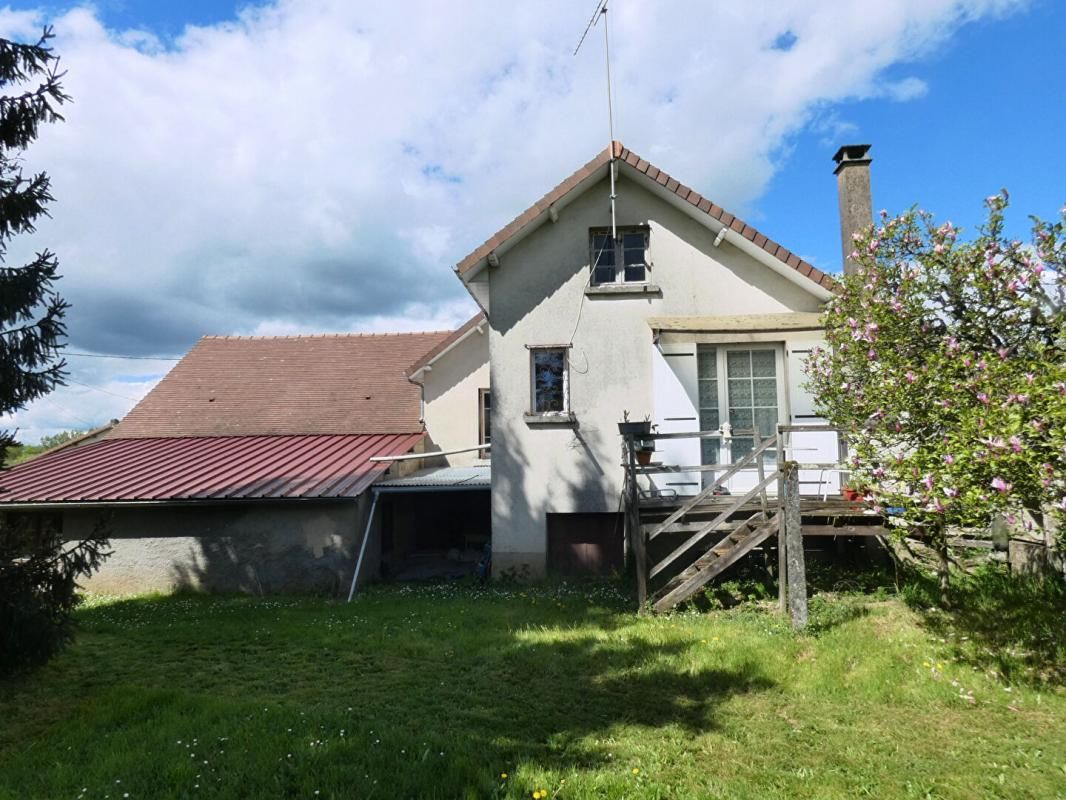 PAYZAC Maison 115 m2 habitables / 3 chambres / s/sol / grand garage / terrain 1548m² 2