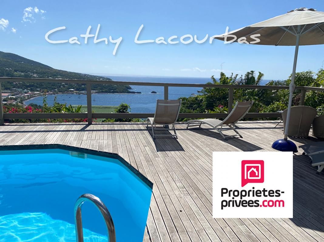 BOUILLANTE 97125 BOUILLANTE - Villa comprenant 5 appartements vue mer et piscine 3