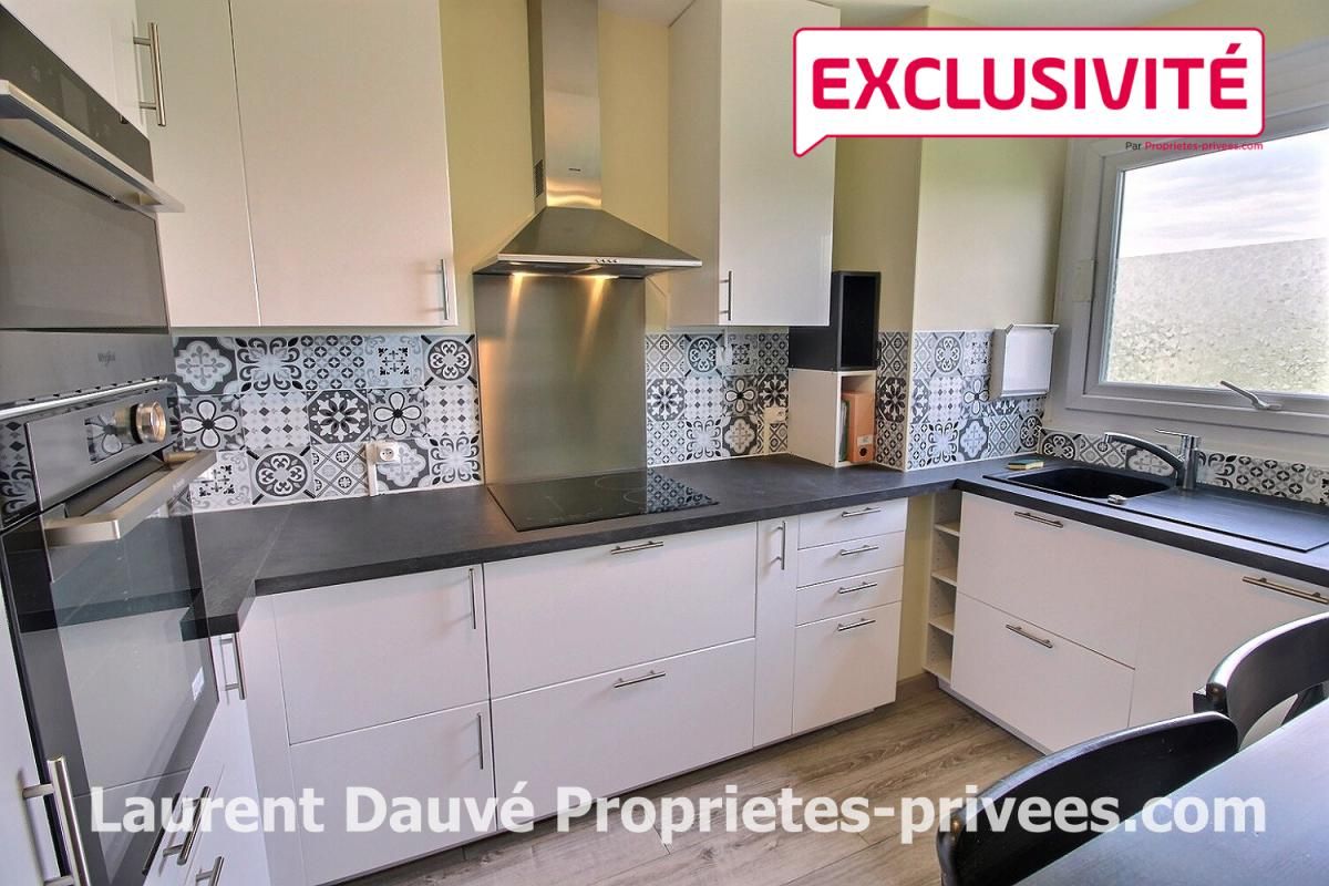 45140 ST JEAN DE LA RUELLE - Appartement 3 chambres avec parking, balcon, cave proche de toutes commodités