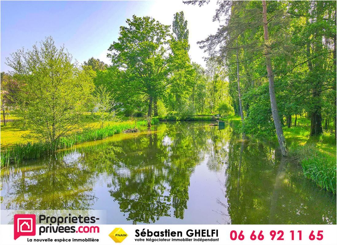 ROMORANTIN-LANTHENAY belle propriete sur plus de 3 hectares avec plan d'eau et bord de rivière 2