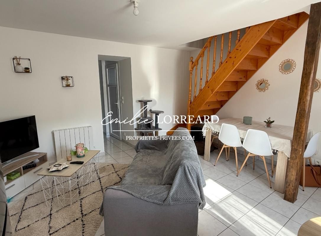 LA BAZOGE Immeuble composé de 2 logements : type T2 et T3 1