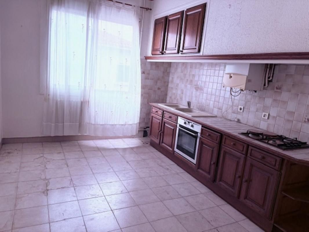 PERPIGNAN Appartement   -  Deuxième  étage - Surf hab  125m²  - Copropriété de 03 lots -  Proche centre ville de Perpignan 3