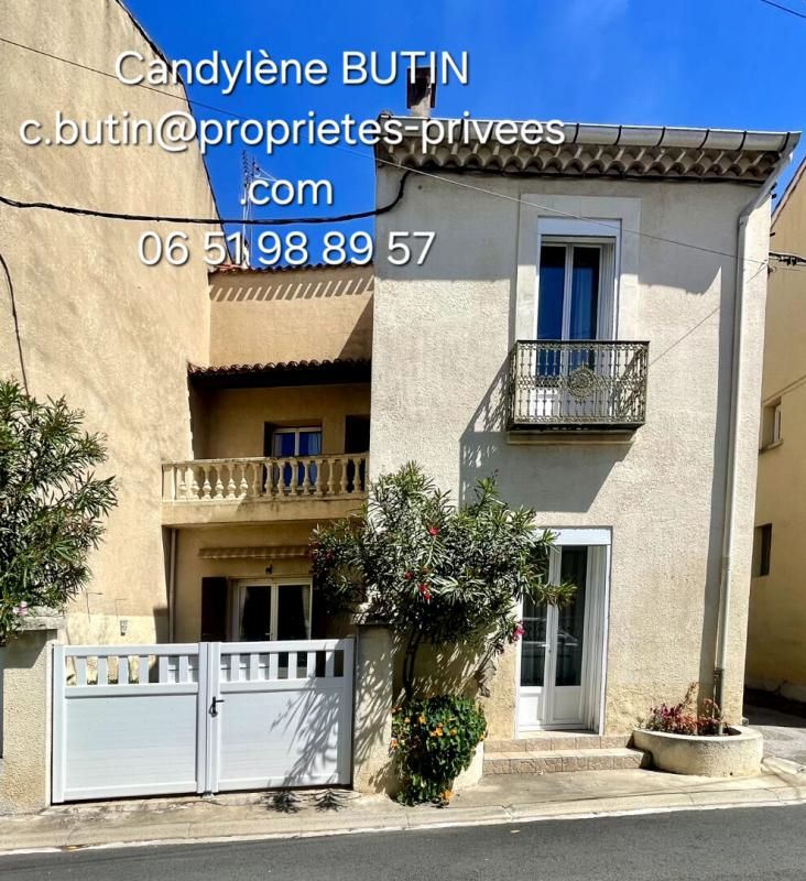 Maison de village spacieuse avec garage et extérieur