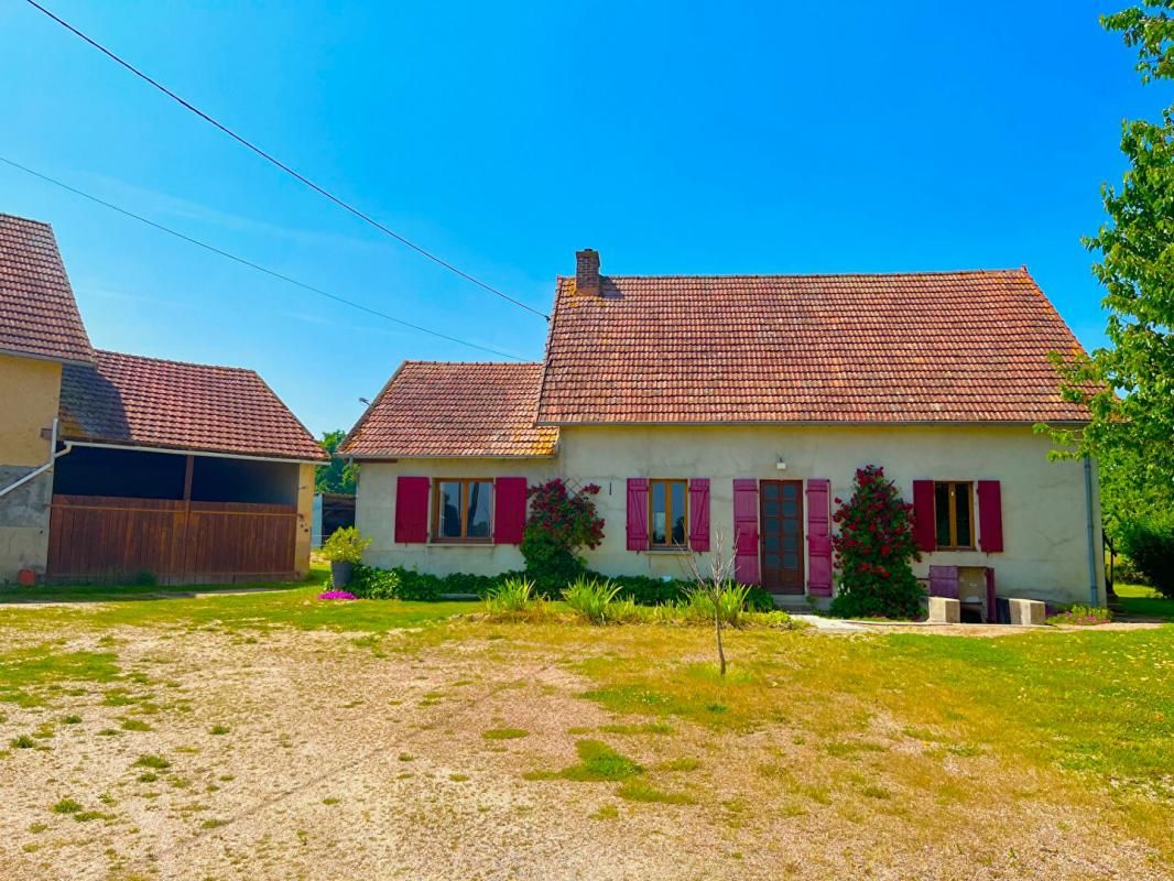 Maison + cave + garage + atelier + puits