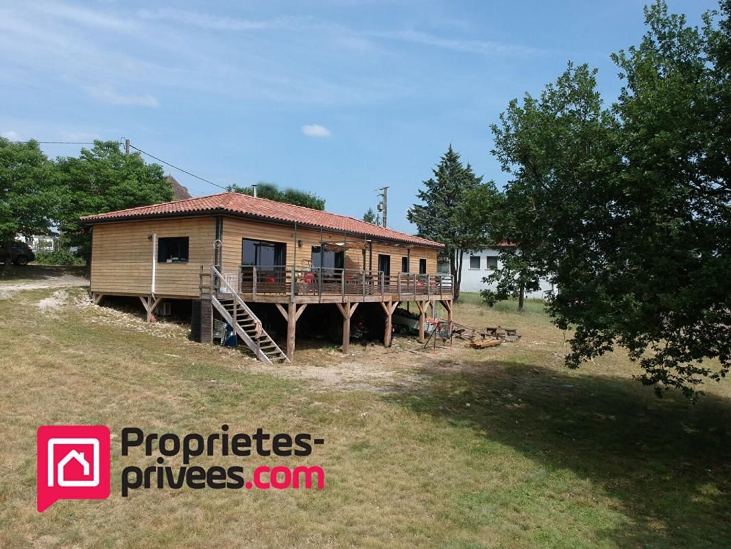 Maison bois de plain-pied dans un bel environnement