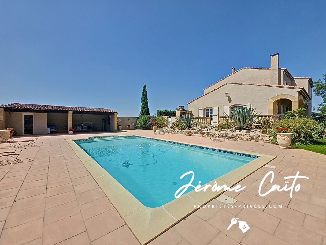 REDESSAN Maison Redessan 6 pièce(s) 178 m2 - 3 Chambres - Piscine - Pool house - Garage 4