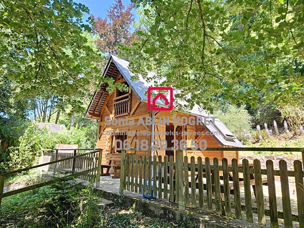 Terrain de loisirs avec chalet bois