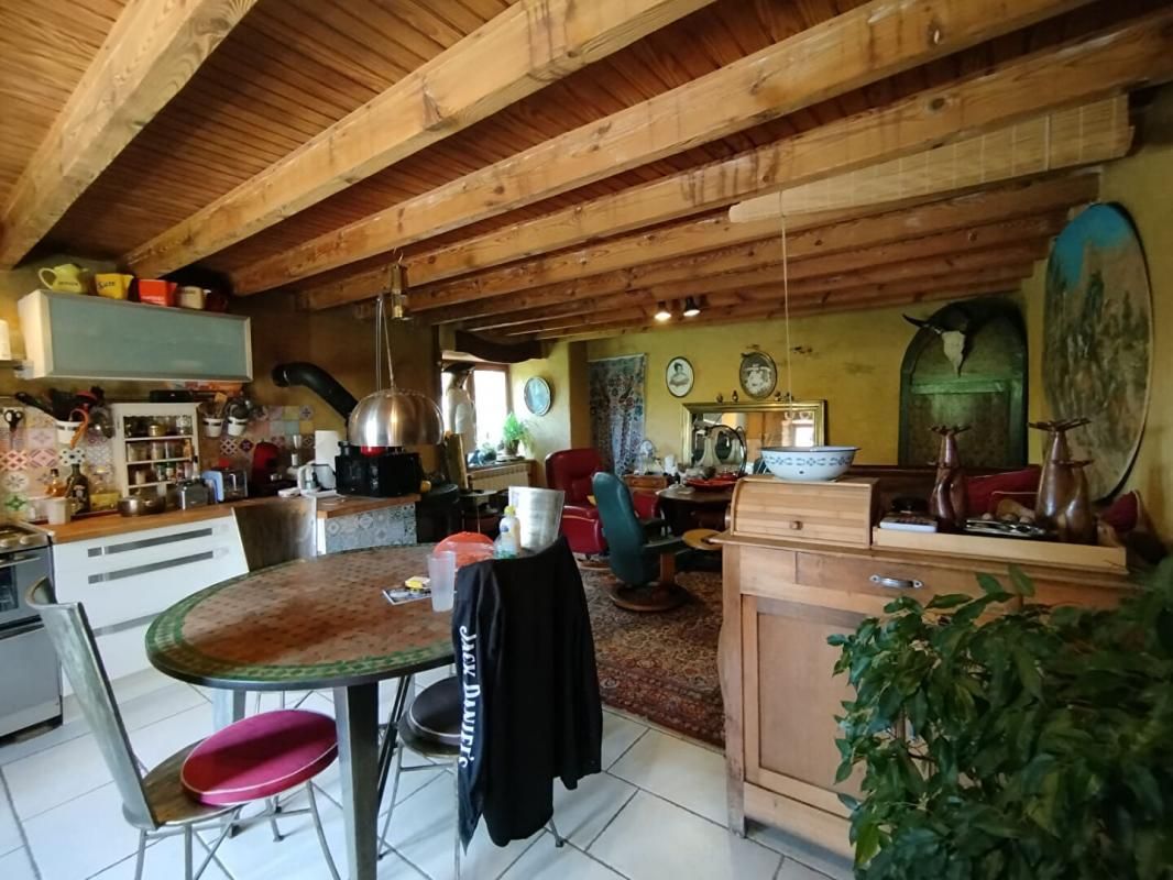 FOURNOLS Maison atypique en pierre rénovée 1