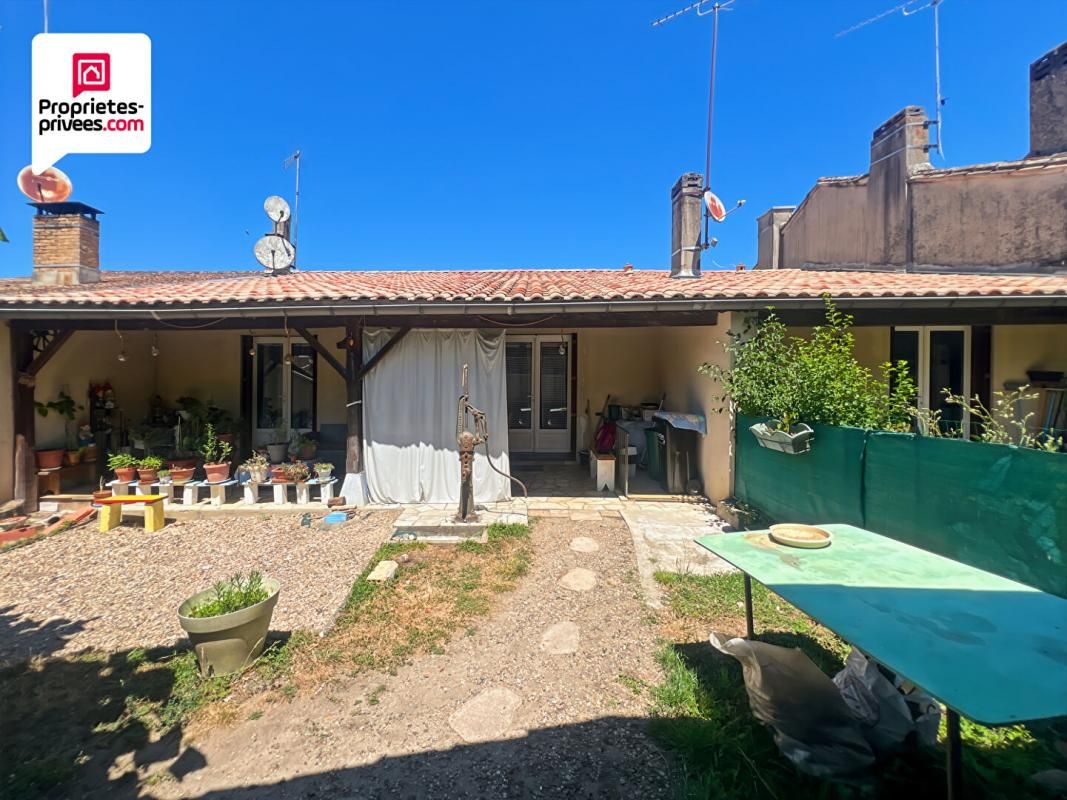 AUROS Immeuble composé de 3 lots - jardin et garages 1