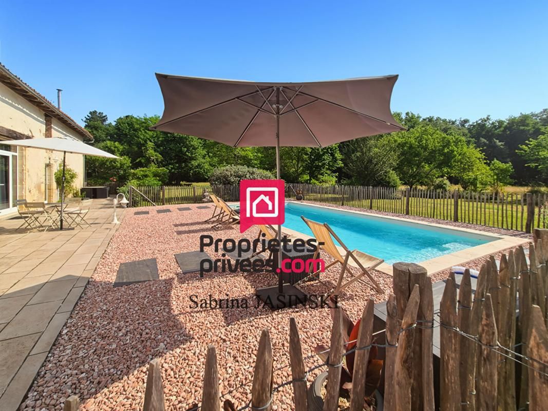 CAPTIEUX Longère de charme en pierre de 260 m2 sur terrain clos et boisé de 13 700 m², avec piscine et dépendances 3