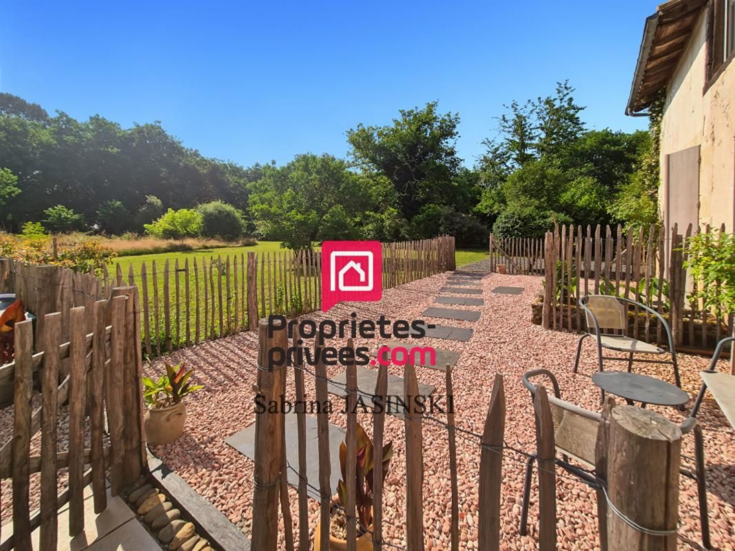 CAPTIEUX Longère de charme en pierre de 260 m2 sur terrain clos et boisé de 13 700 m², avec piscine et dépendances 4