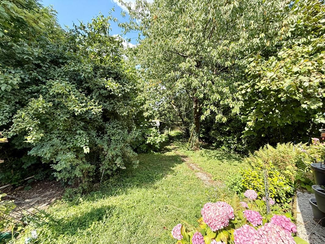 Maison familiale 6 pièces avec véranda avec un  beau jardin de 600 m²