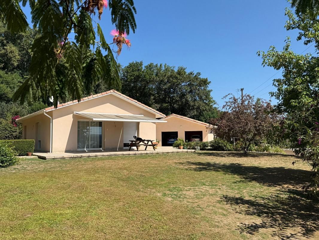 AIRE-SUR-L'ADOUR Maison contemporaine avec terrain et double garage! 1