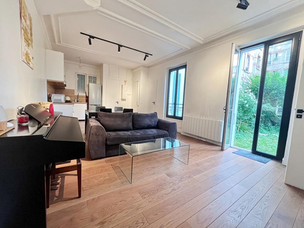 PARIS-17E-ARRONDISSEMENT Appartement avec jardin cité Lemercier 1