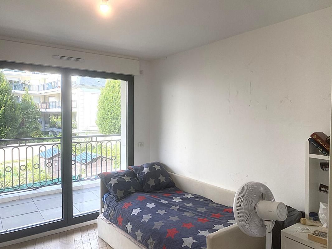 PUTEAUX Somptueux duplex 4 pièces situé en rez-de-jardin à vendre à Puteaux 4