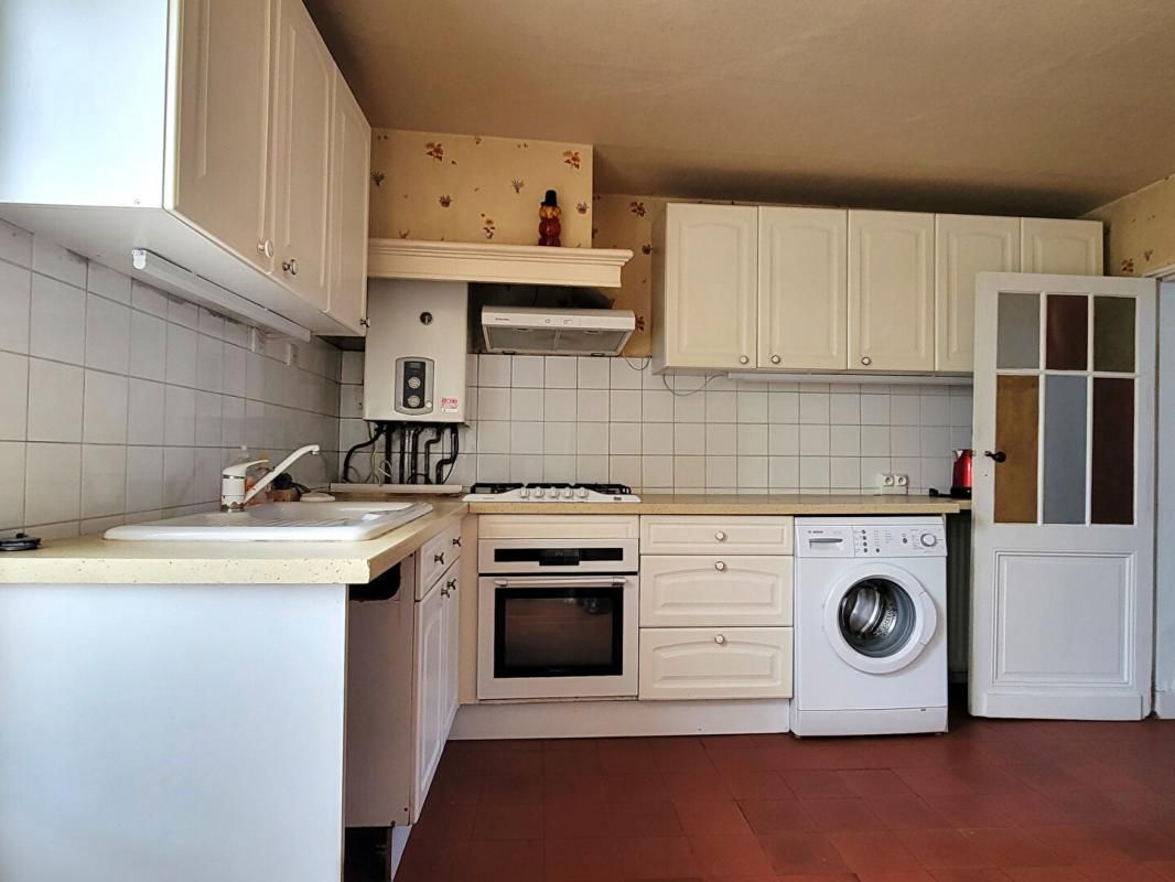 BORDEAUX Le charme de l'ancien pour cette maison de ville avec jardin , véranda, deux chambres et bureau 4