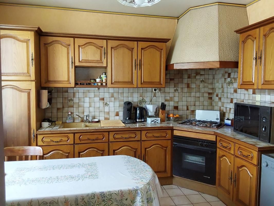 ROSTRENEN Maison  avec vie de plain pied. Rostrenen 7 pièce(s) 113 m2 2