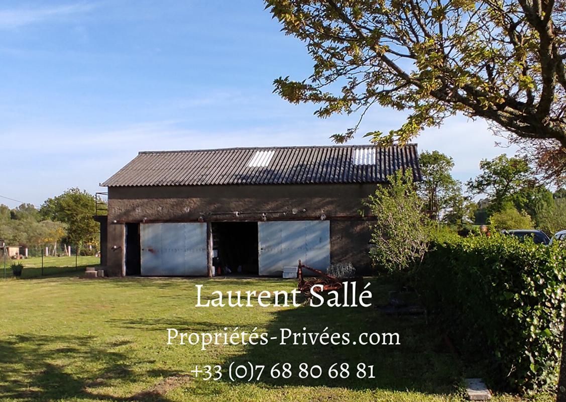 LARRE Terrain constructible de 1 400 m² avec dépendance 2