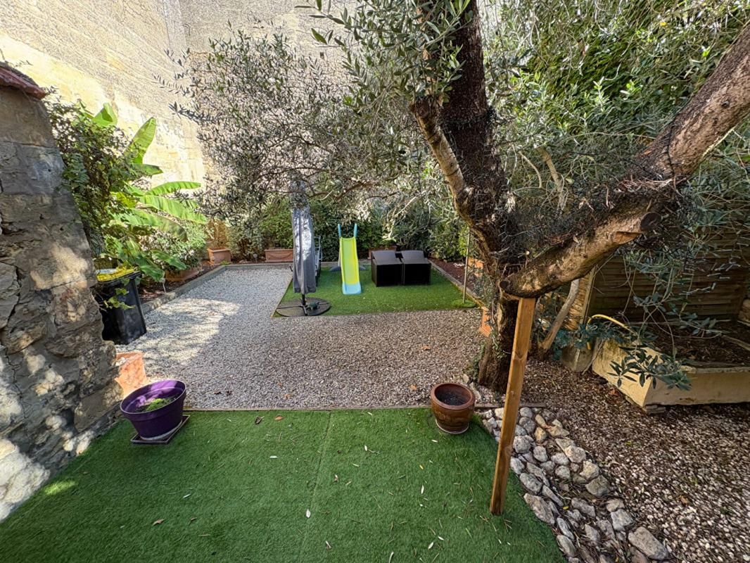 RAUZAN RAUZAN - IMMEUBLE MIXTE, LOCAL COMMERCIAL ET LOGEMENT 1