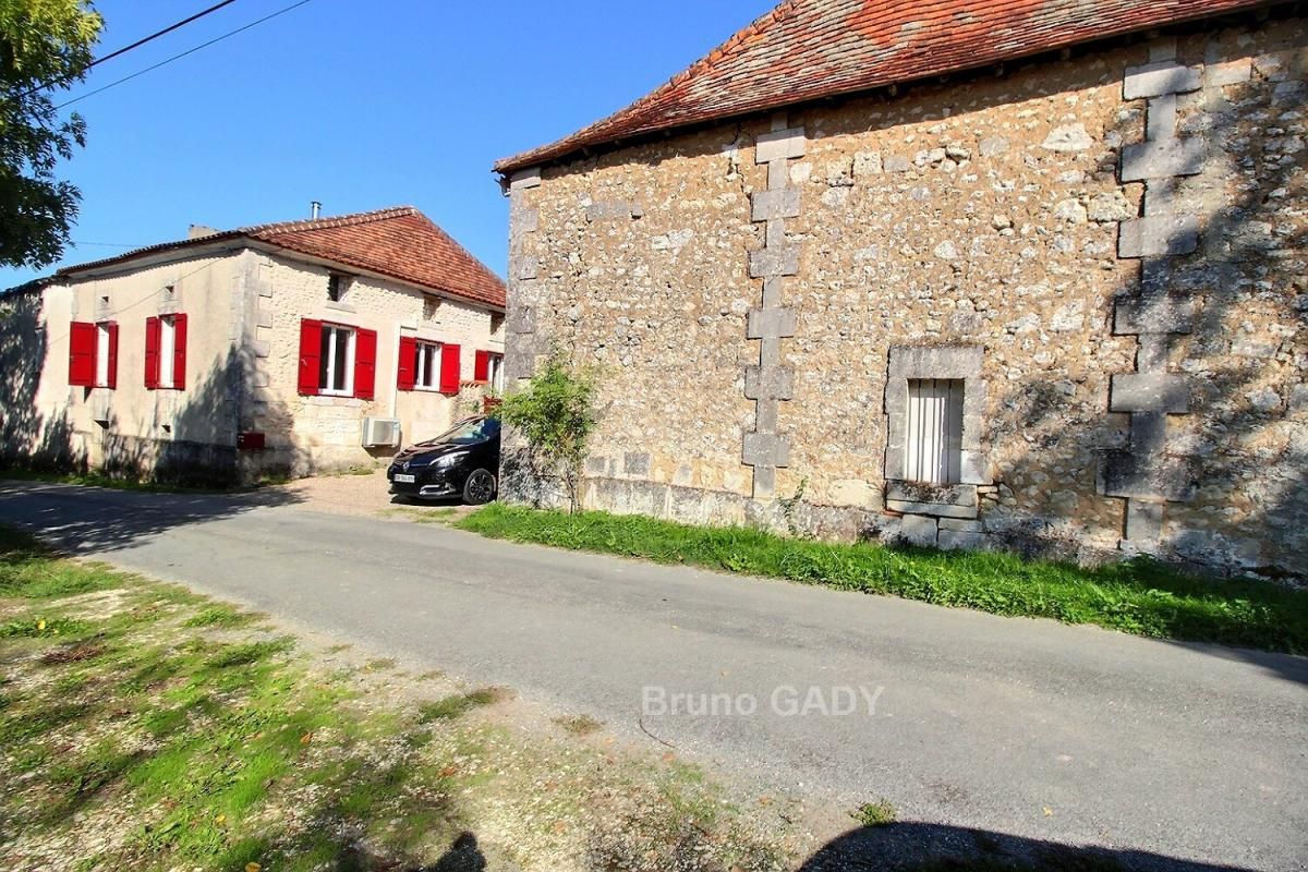 TOCANE-SAINT-APRE Ensemble immobilier avec maison ancienne en pierre et dépendances 1