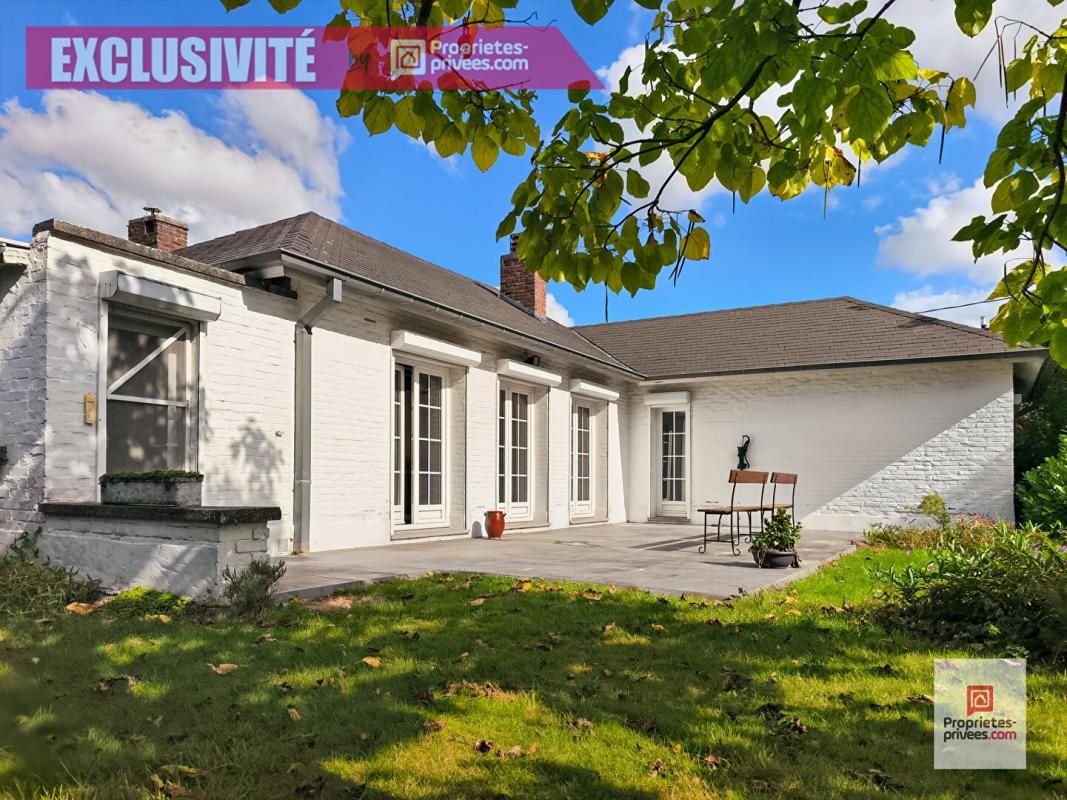WATTRELOS Wattrelos, idéalement situé, plain pied avec 4 chambres, jardin, double garage 1