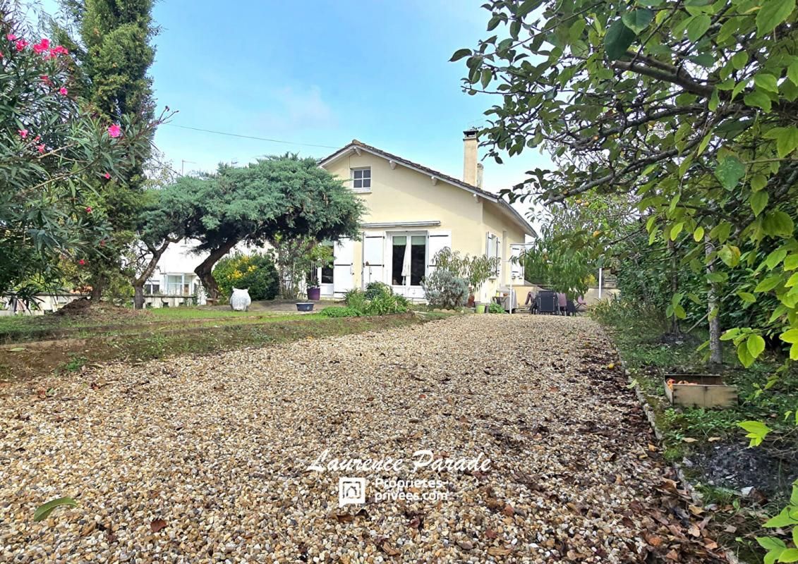 Maison centre ville avec rez de jardin et garage