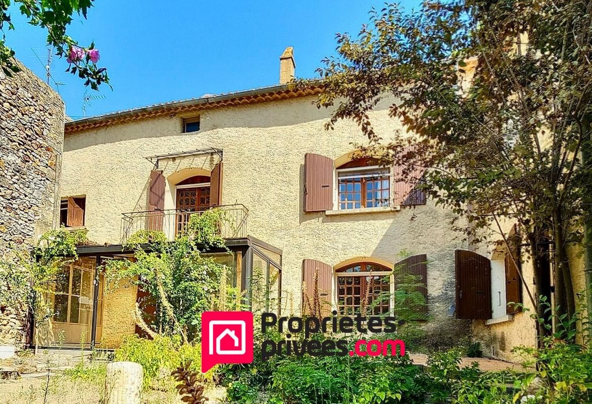 UZES Proche Uzès, Maison de village avec jardin et cour intérieure 1