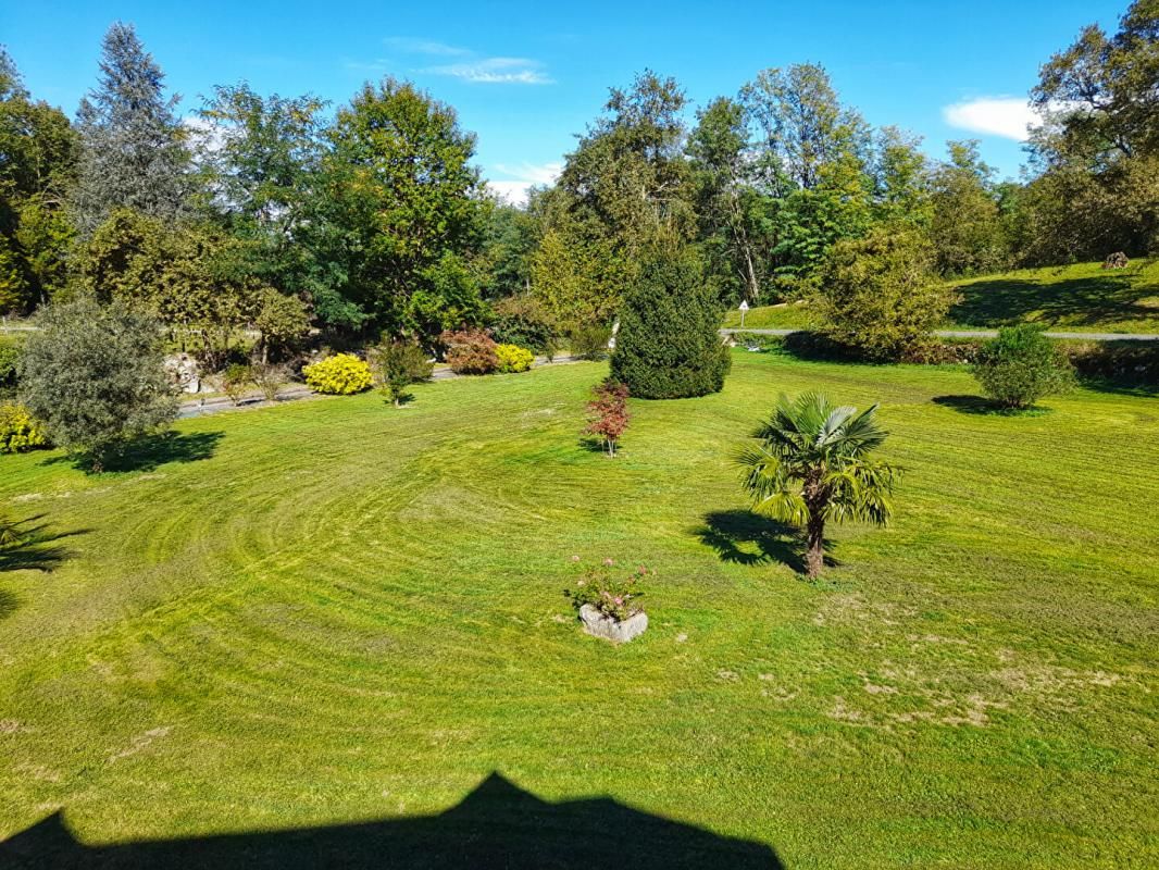 BUZY Demeure de 106m2 sur un grand jardin paysager 4
