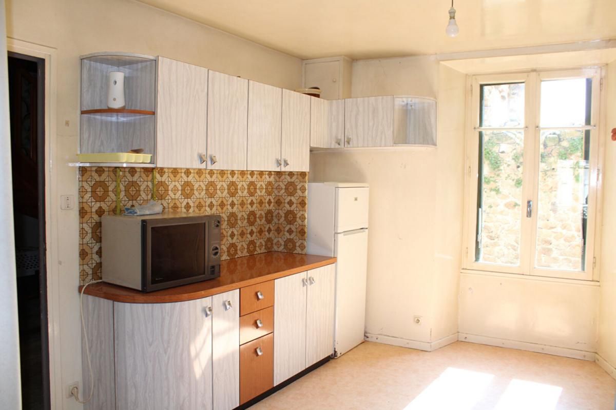LANGOGNE Maison 7 pièce(s) 130 m2 avec garage et local commercial 3