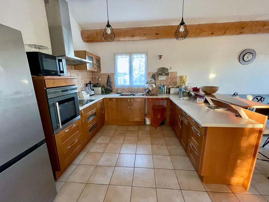 SAINT-CHRISTOL-LES-ALES Maison familiale avec jardin arboré 2