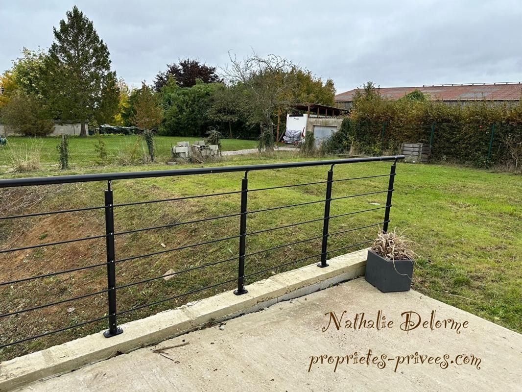 HODENC-L'EVEQUE Jolie maison individuelle sur terrain clos 4