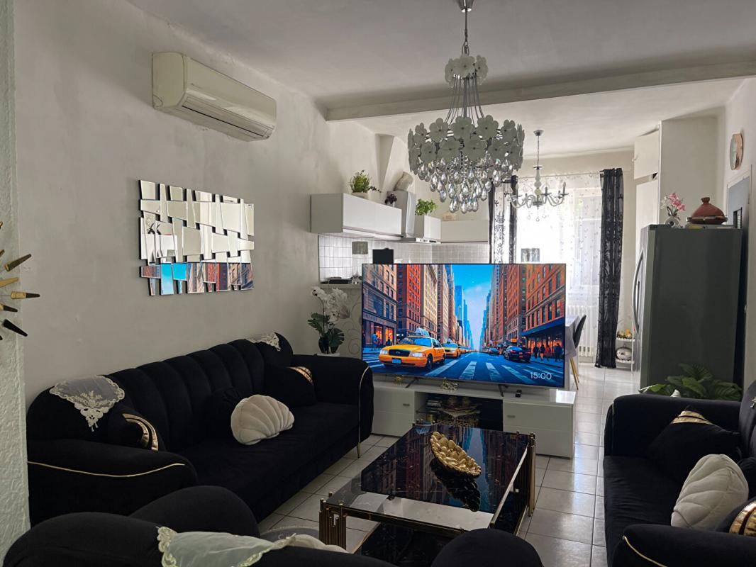 AIGALIERS A vendre maison mitoyenne  3 pièces de  65 m2 avec grand garage sur terrain de 295 m2 3