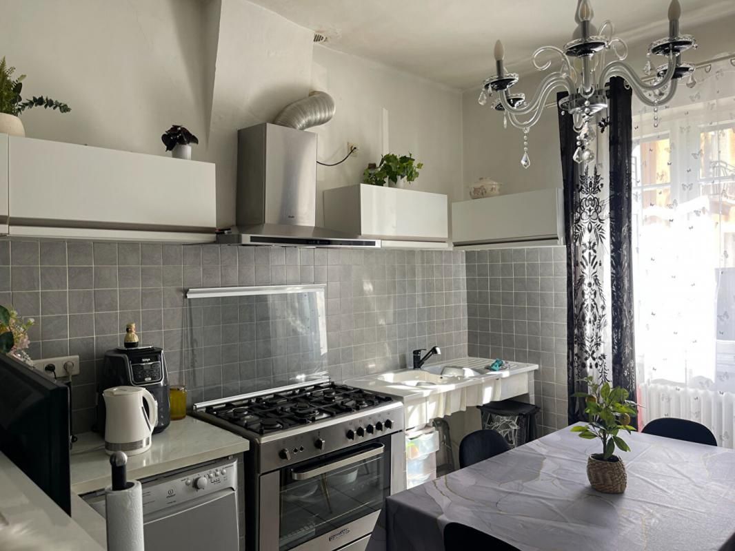 AIGALIERS A vendre maison mitoyenne  3 pièces de  65 m2 avec grand garage sur terrain de 295 m2 4