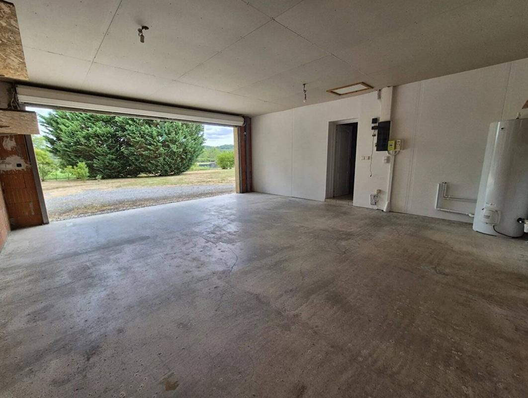 PAVIE Maison plain-pied T4 de 103m2 avec garage de 42m2 et terrain de 2200m2 3