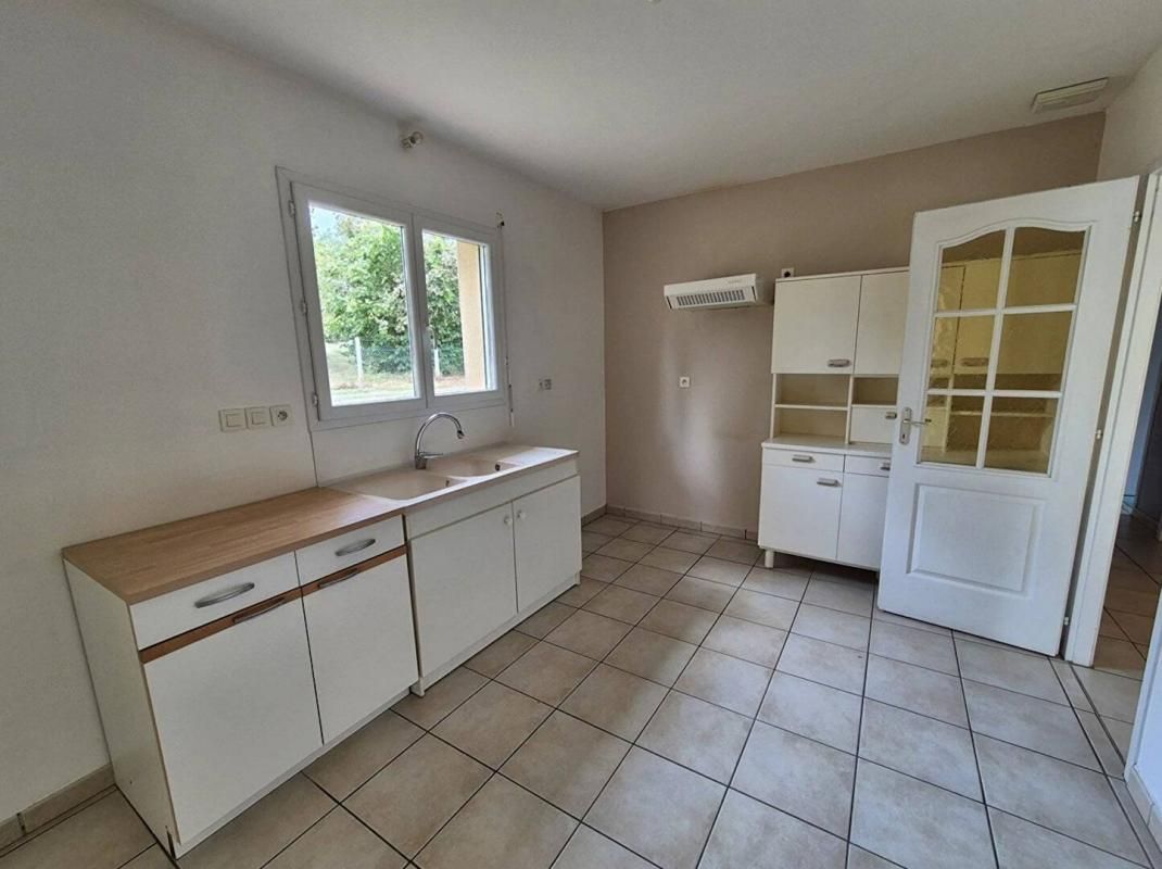 PAVIE Maison plain-pied T4 de 103m2 avec garage de 42m2 et terrain de 2200m2 4