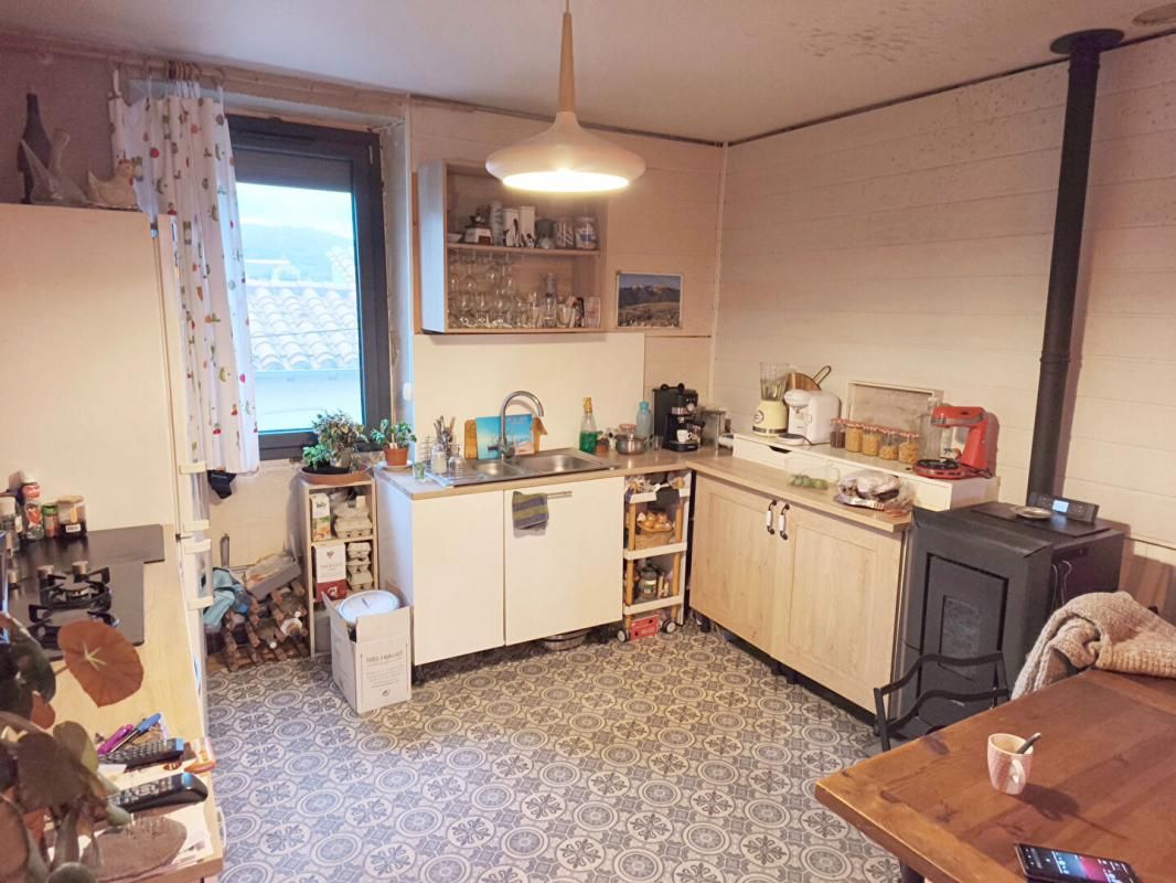 SAINT-LAURENT-DE-CERDANS Appartement T3 60 m2 cave et jardinet 4