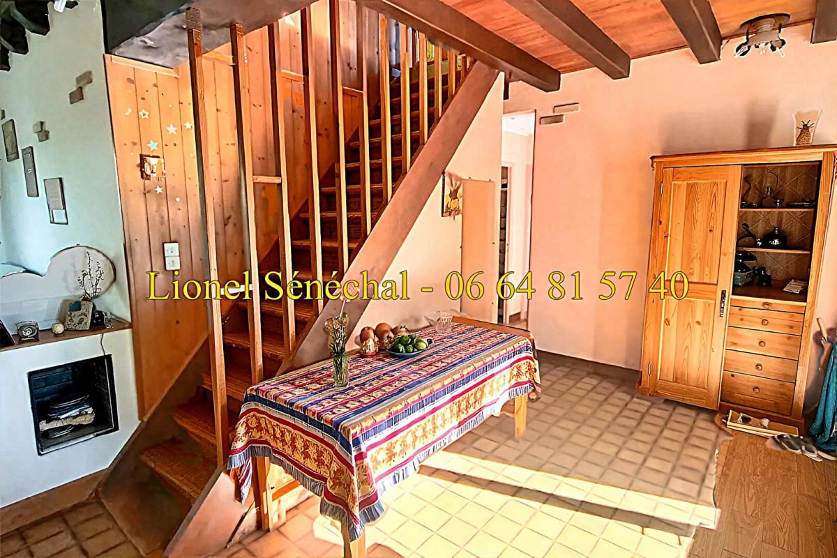 BRETTE-LES-PINS Maison 8 pièces de 135 m2 habitables avec un sous sol complet sur une parcelle de plus de 1 700 m2 4