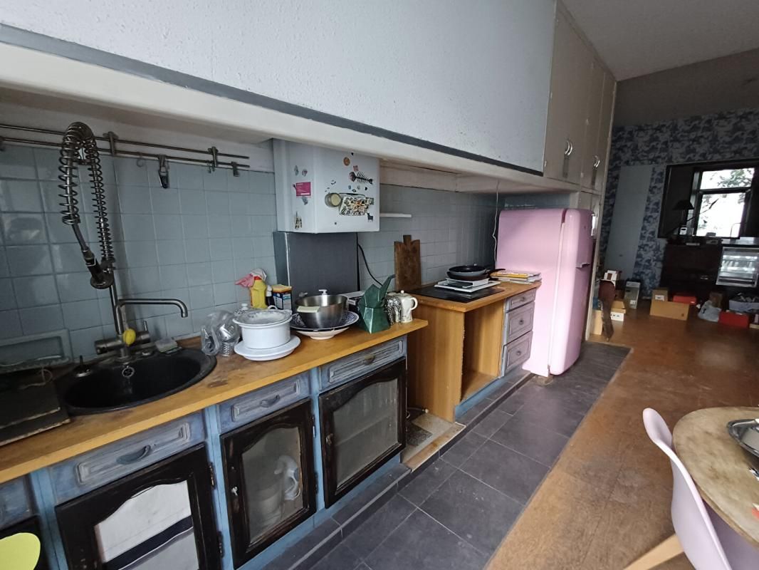 PERPIGNAN Perpignan- Maison de ville années 30 en 2 faces de 120m2 habitable + combles aménagés et garage de 62m2 3