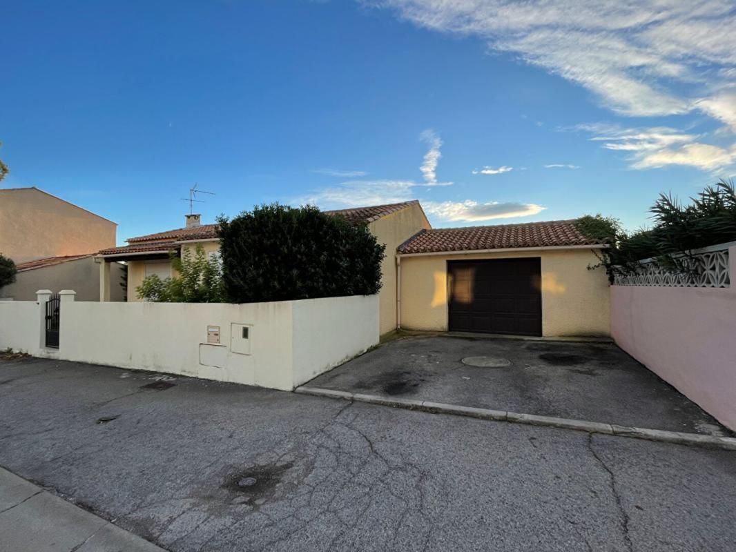 BAILLARGUES MAISON DE PLAIN PIED DE 95 M² habitable (environ)dont véranda et de 3 chambres , garage de 25 m²(environ) sur 369 m² de terrain? 5 5/ 2