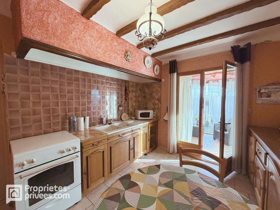 BAGNOLS-SUR-CEZE Villa de plain-pied avec garage et grand jardin à Bagnols Sur Cèze 4